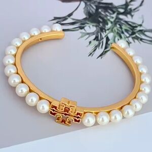TORI BURCH EMBELLISHED CUFF BRACELET GOLD.